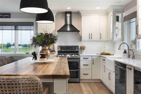 dark kitchen cabinets stainless steel appliances and butcher block|black and white kitchen cabinets.